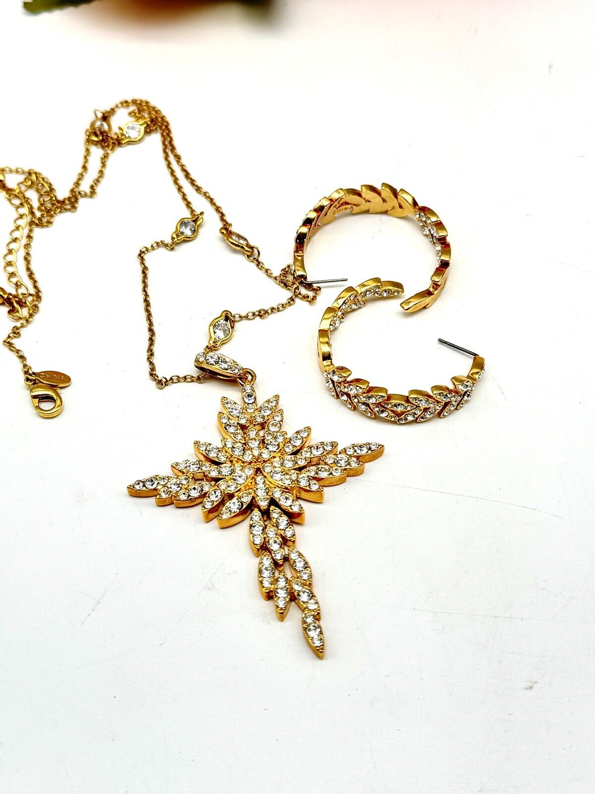 Real Collectibles by Adrienne Clear Crystal Cross ARTICULATED with Hoop Earrings