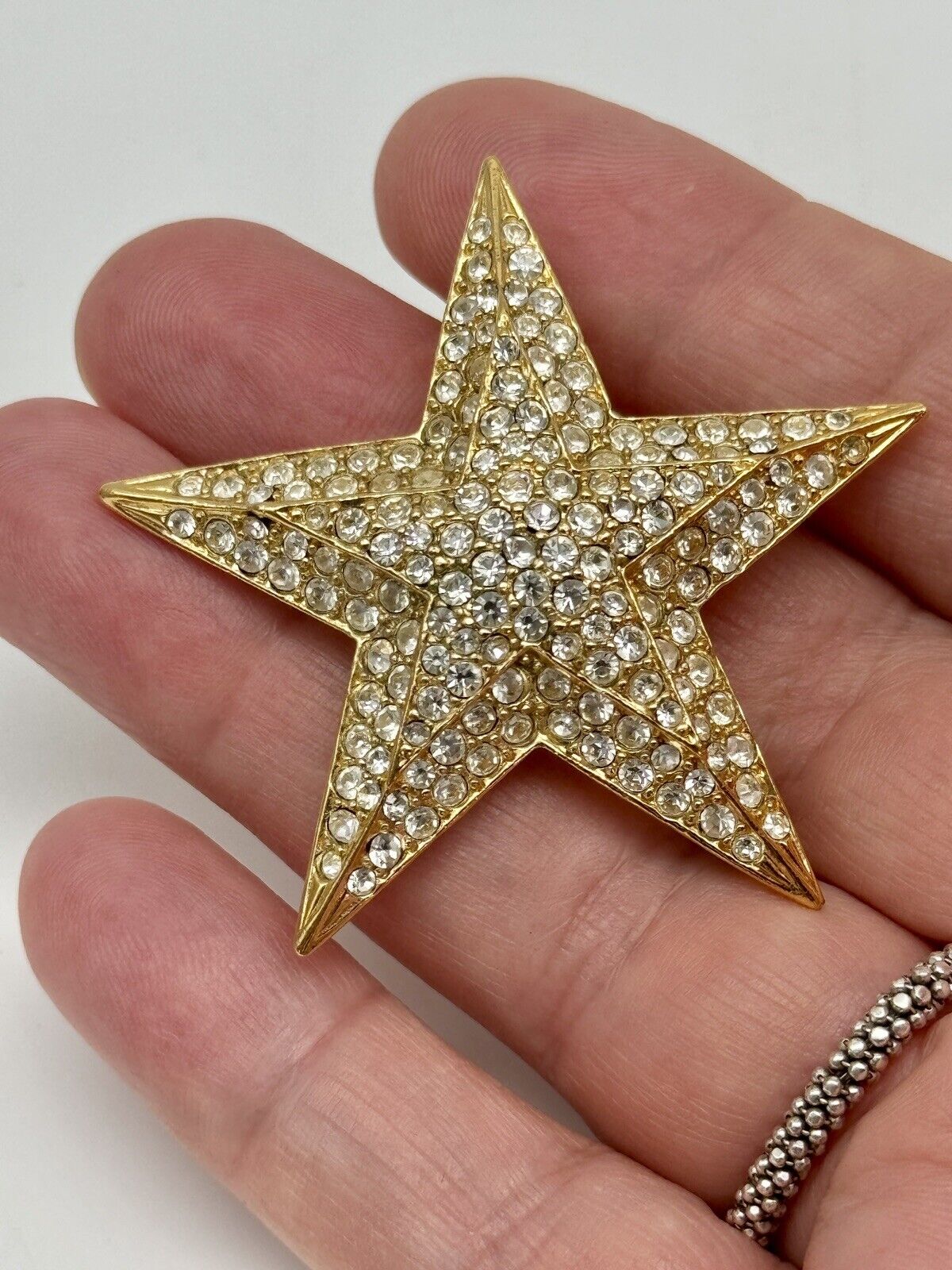 Vintage Joan Rivers Clear Rhinestone Gold Tone Star Brooch