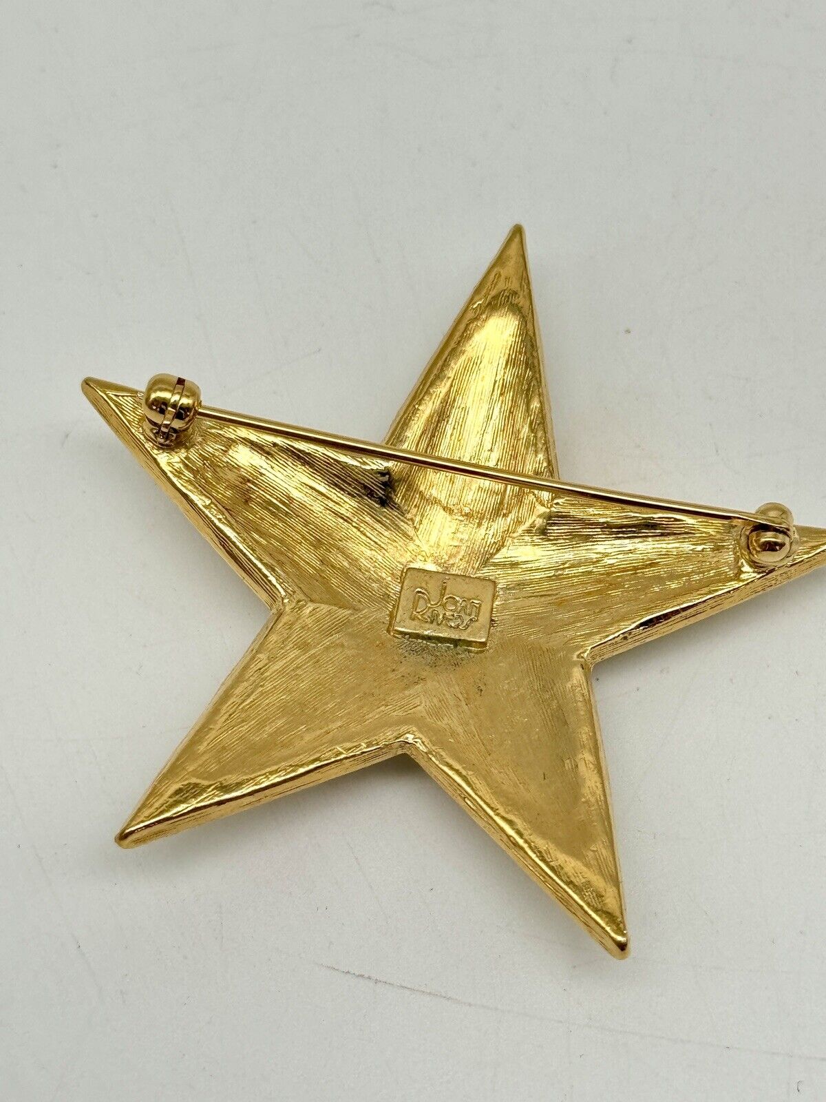 Vintage Joan Rivers Clear Rhinestone Gold Tone Star Brooch
