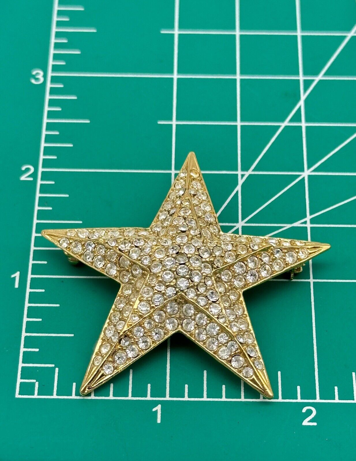 Vintage Joan Rivers Clear Rhinestone Gold Tone Star Brooch