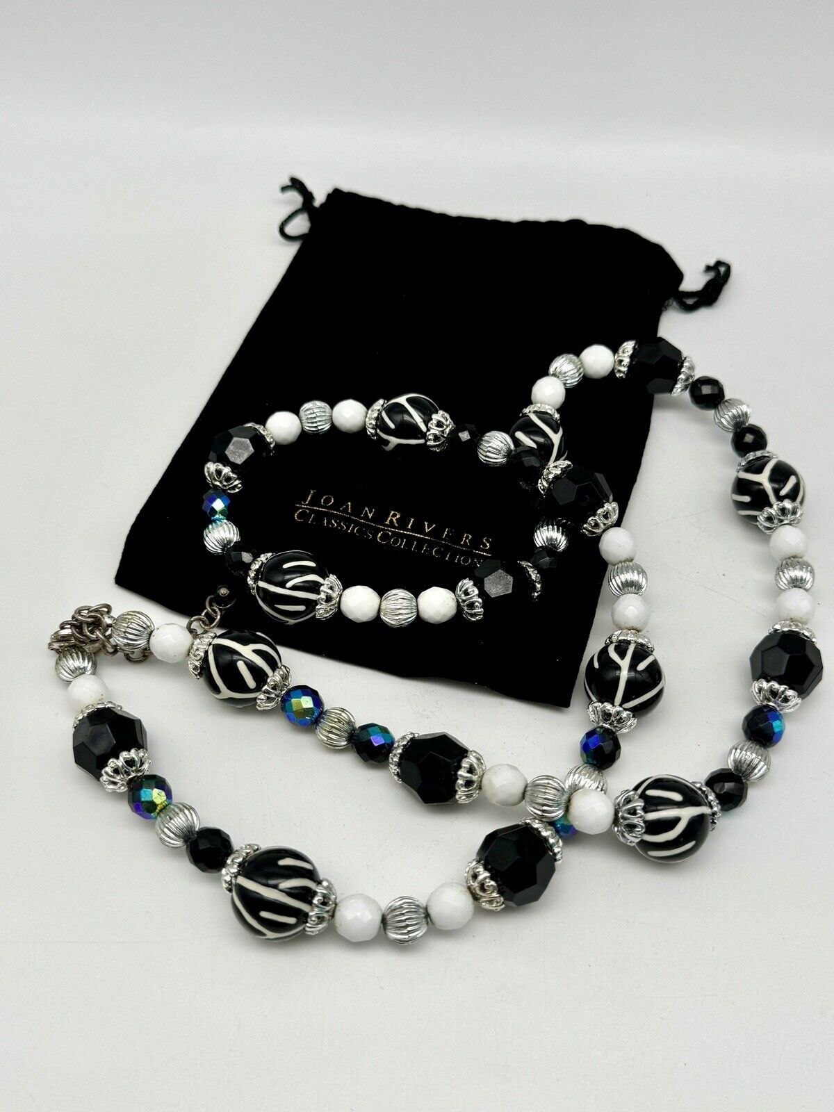 Joan Rivers Necklace 36" white black Zebra iridescent blue silver tones