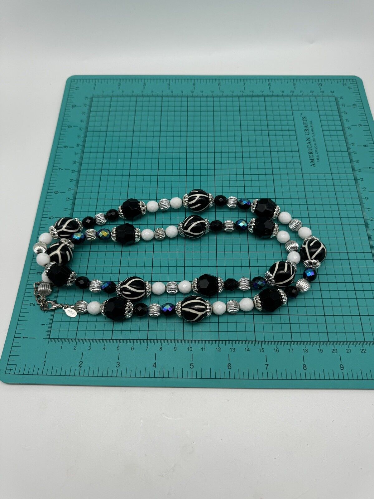Joan Rivers Necklace 36" white black Zebra iridescent blue silver tones