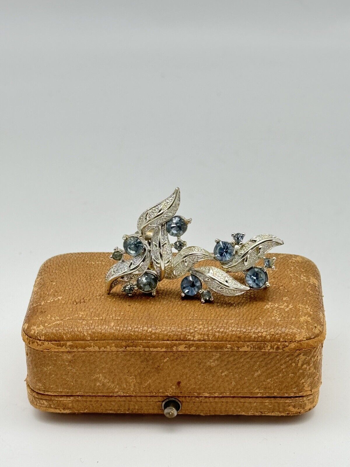 Vintage CORO Signed Earrings Silvertone Ice Blue Rhinestone Clip one