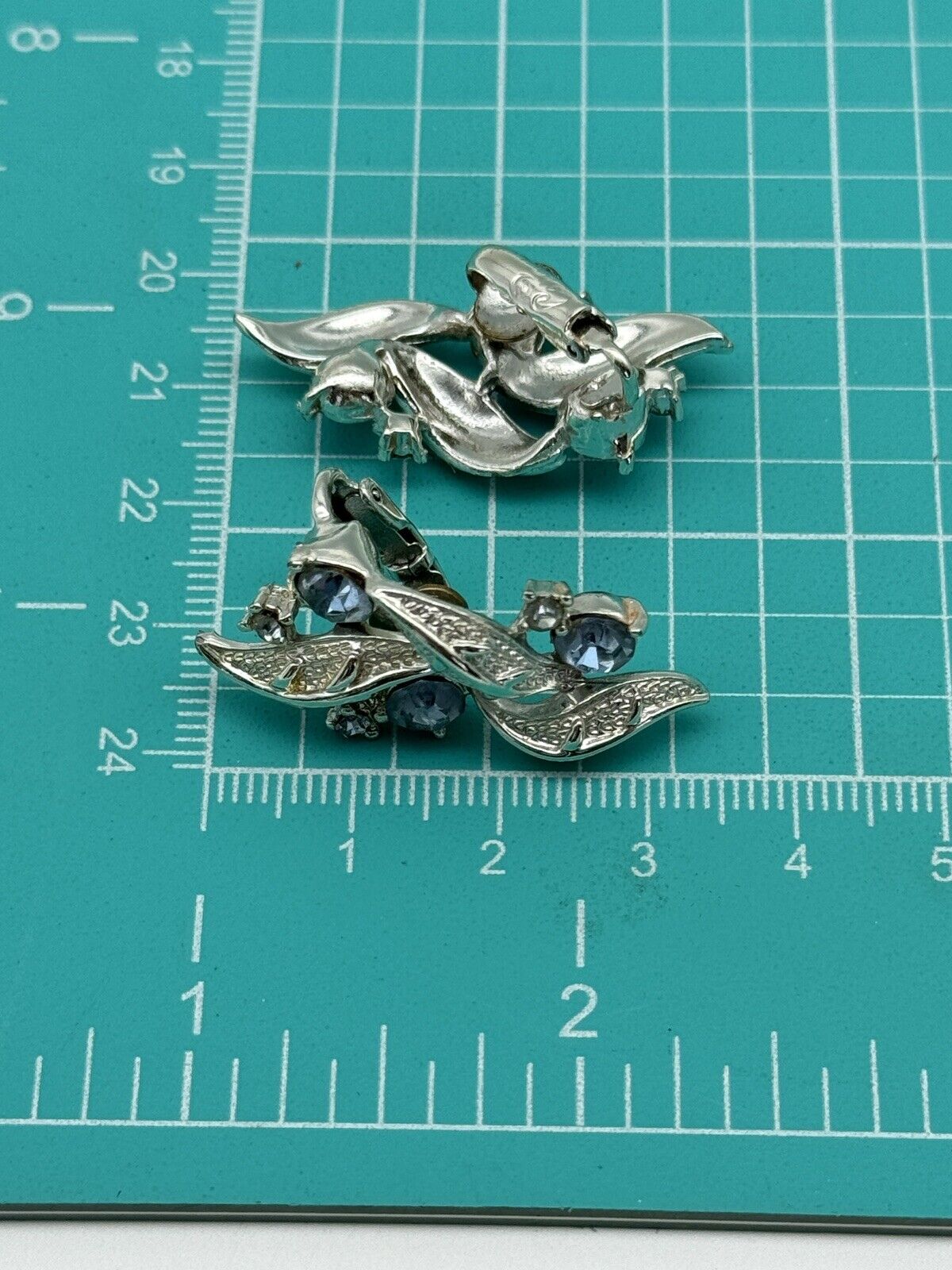 Vintage CORO Signed Earrings Silvertone Ice Blue Rhinestone Clip one