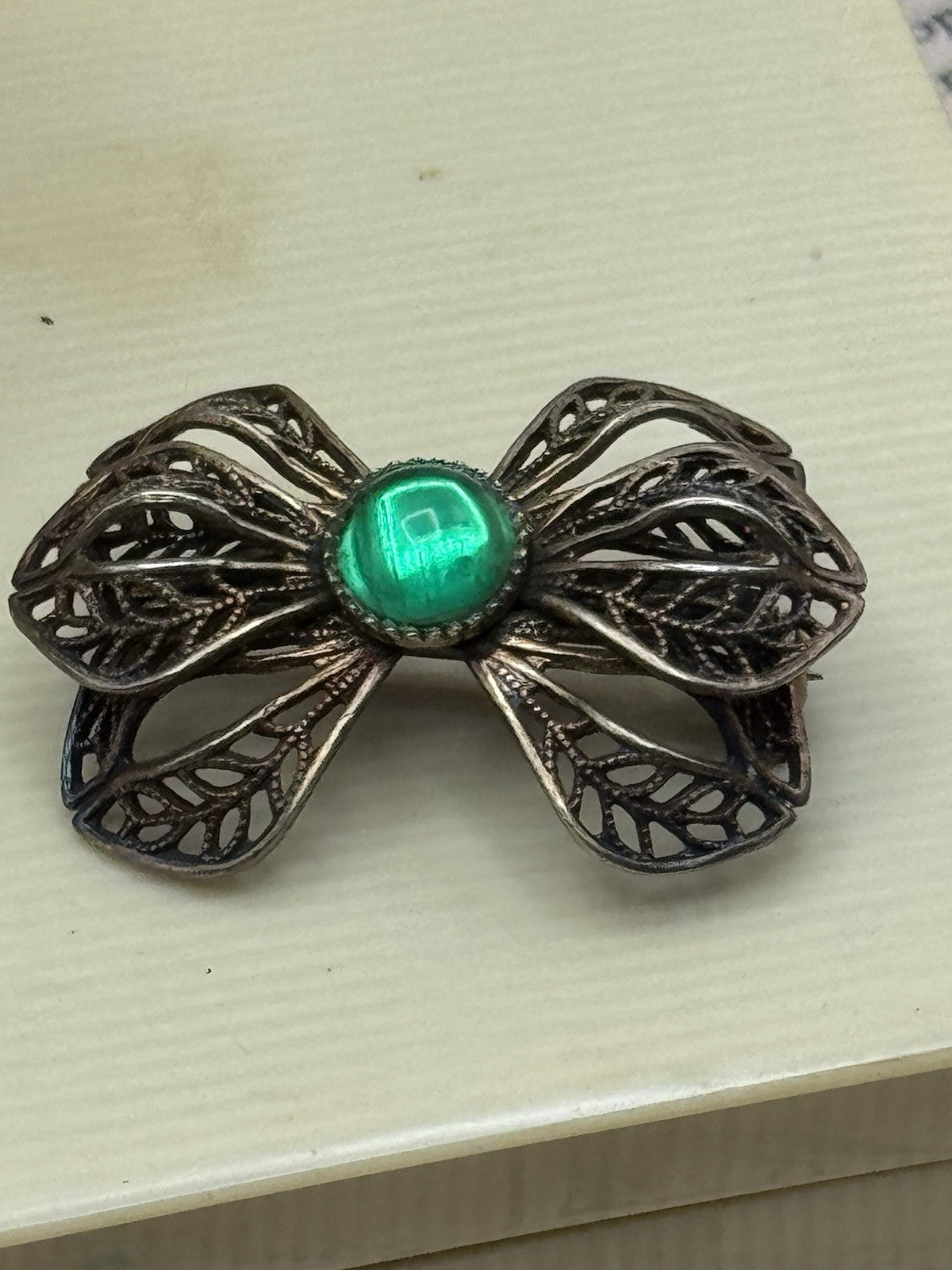 Vintage Brass Tone Below Ribbon Brooch Green Center Stone ESTATE FIND