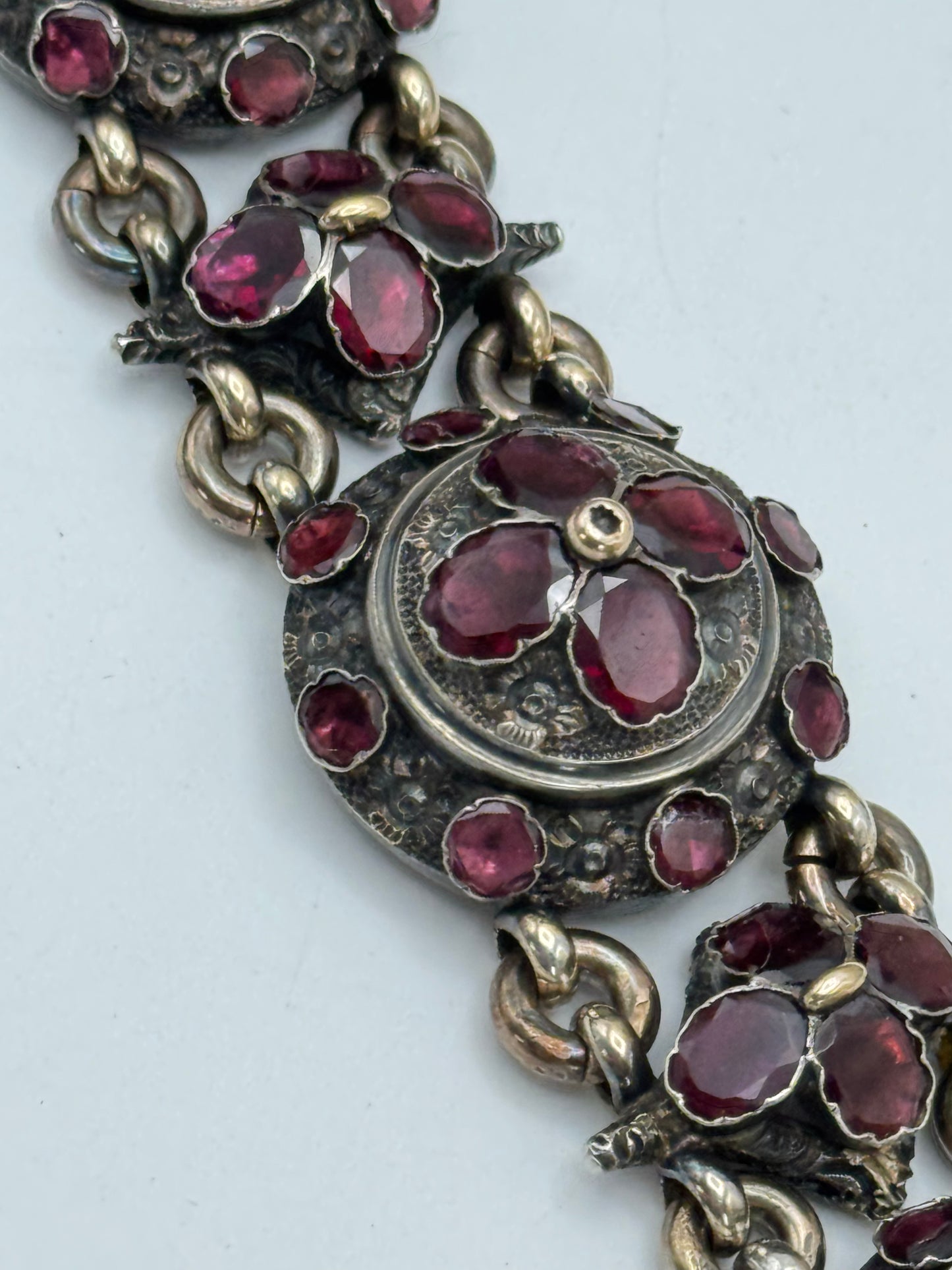 ANTIQUE GEORGIAN Repoussé Bracelet in Silver with Table Cut Garnets