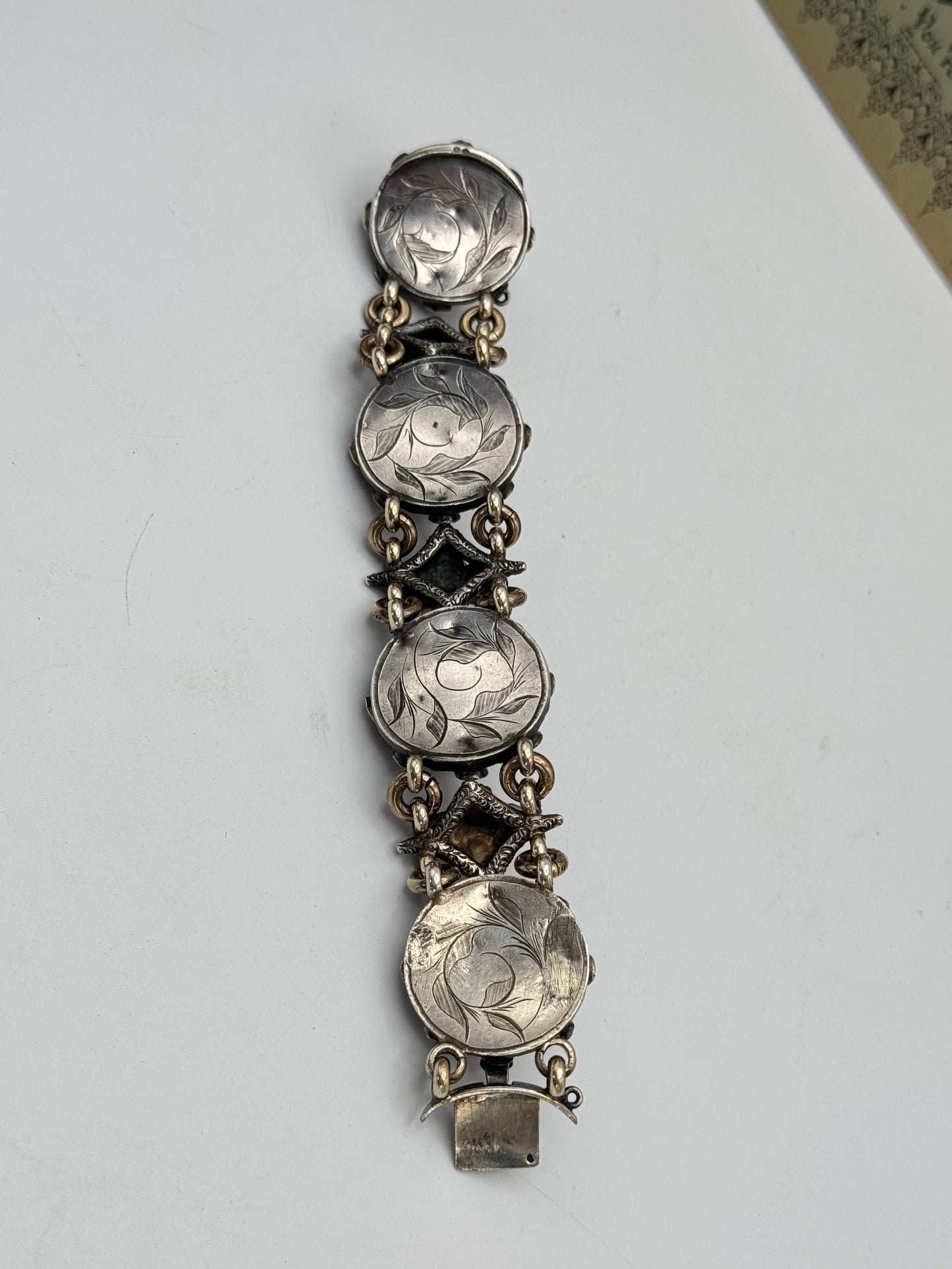 ANTIQUE GEORGIAN Repoussé Bracelet in Silver with Table Cut Garnets