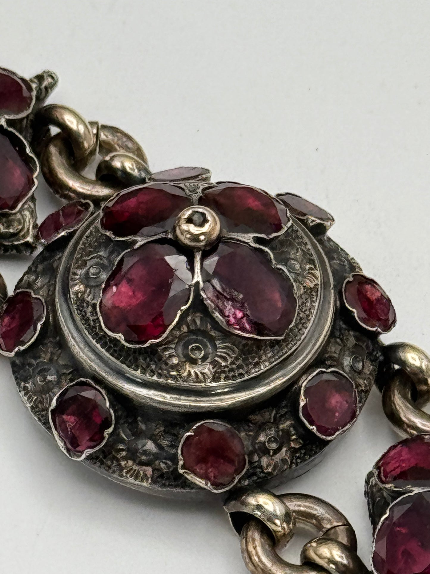 ANTIQUE GEORGIAN Repoussé Bracelet in Silver with Table Cut Garnets