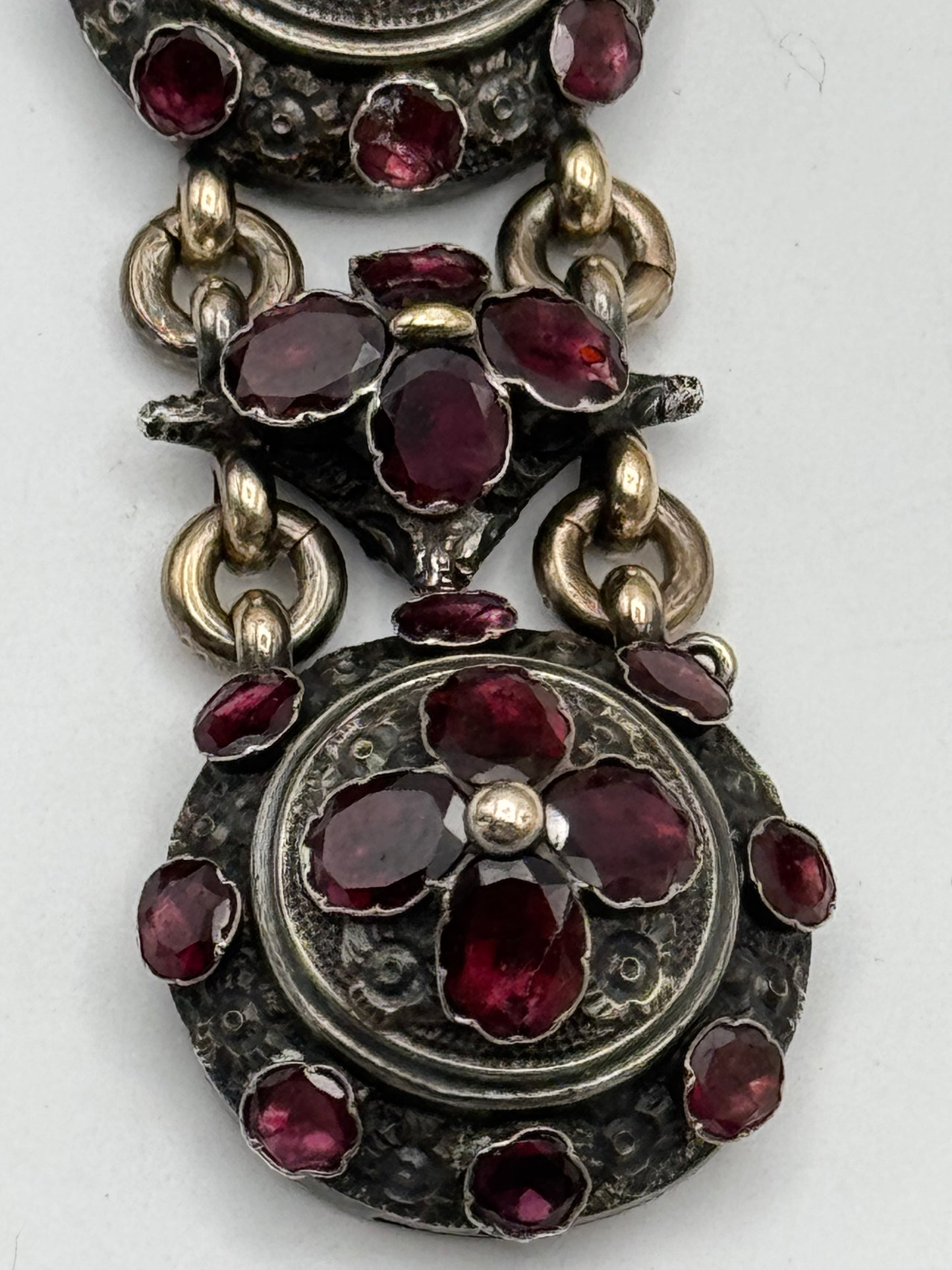 ANTIQUE GEORGIAN Repoussé Bracelet in Silver with Table Cut Garnets