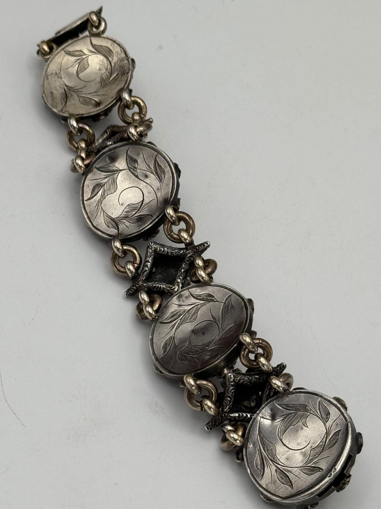 ANTIQUE GEORGIAN Repoussé Bracelet in Silver with Table Cut Garnets