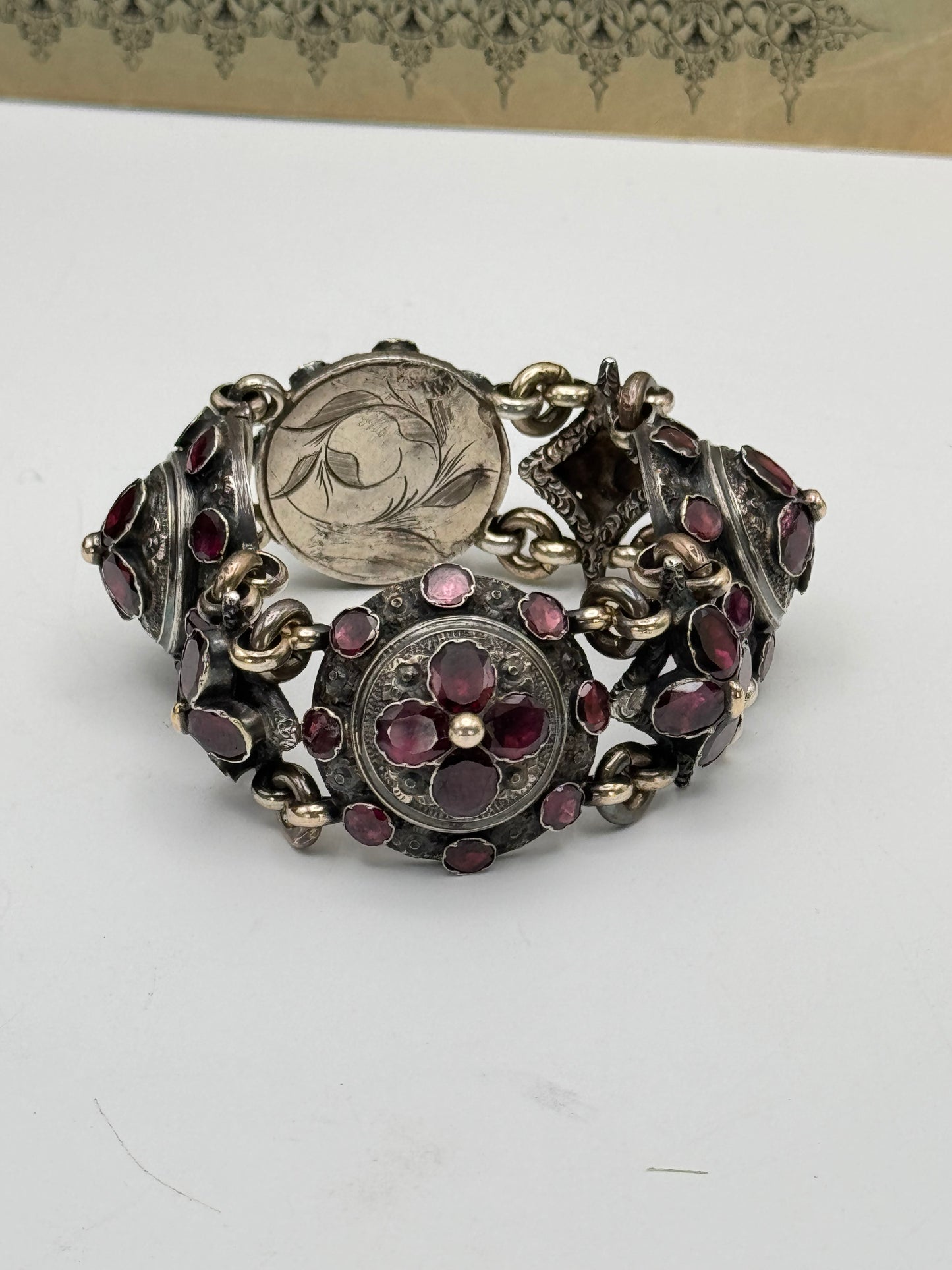 ANTIQUE GEORGIAN Repoussé Bracelet in Silver with Table Cut Garnets