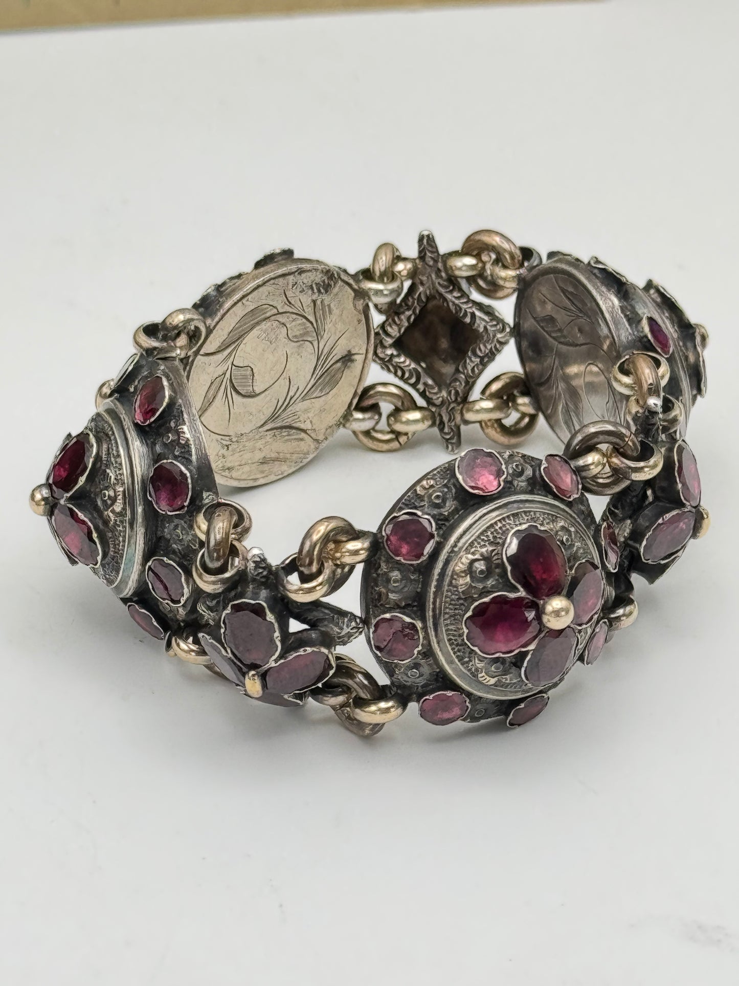 ANTIQUE GEORGIAN Repoussé Bracelet in Silver with Table Cut Garnets