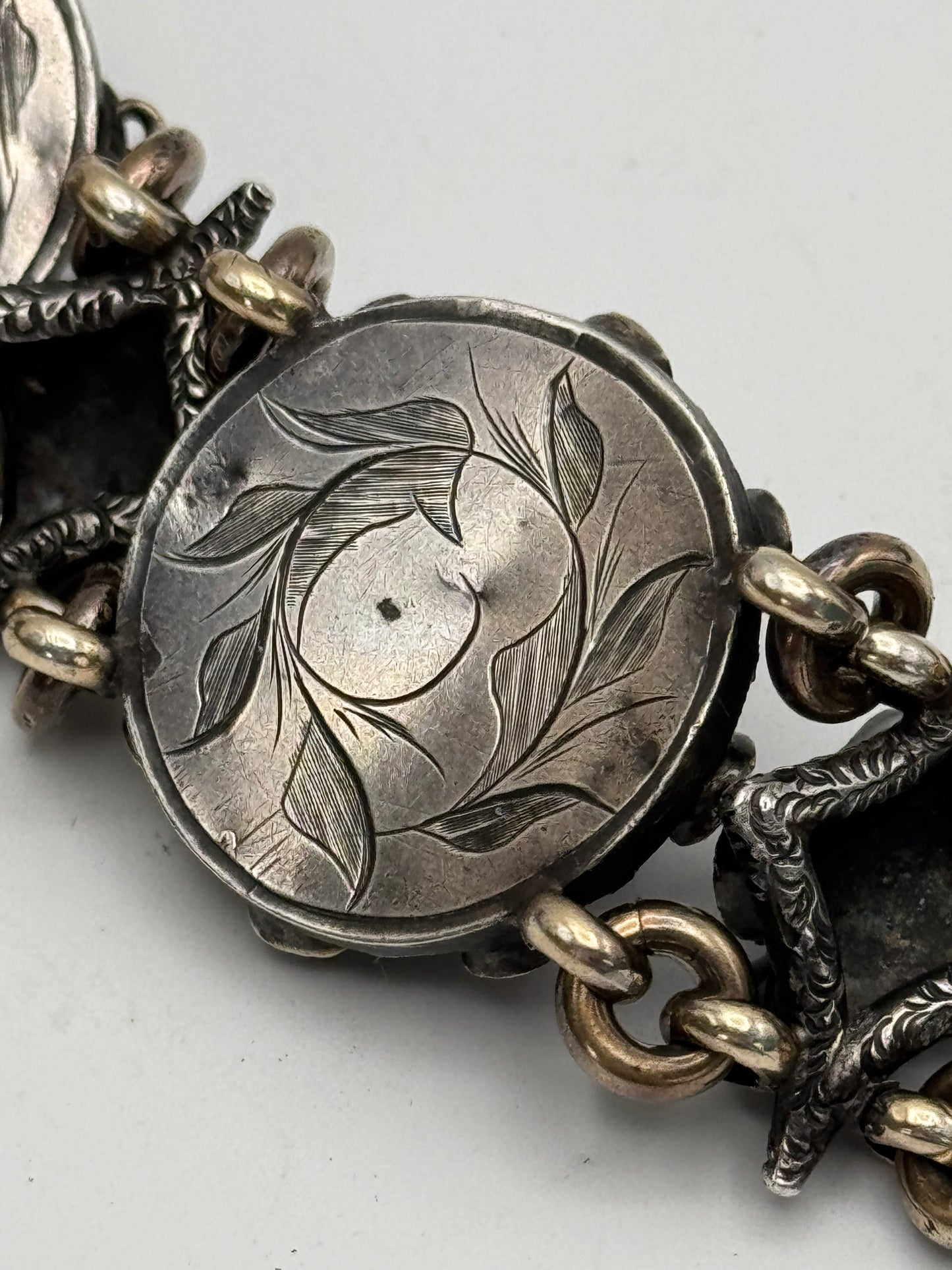 ANTIQUE GEORGIAN Repoussé Bracelet in Silver with Table Cut Garnets