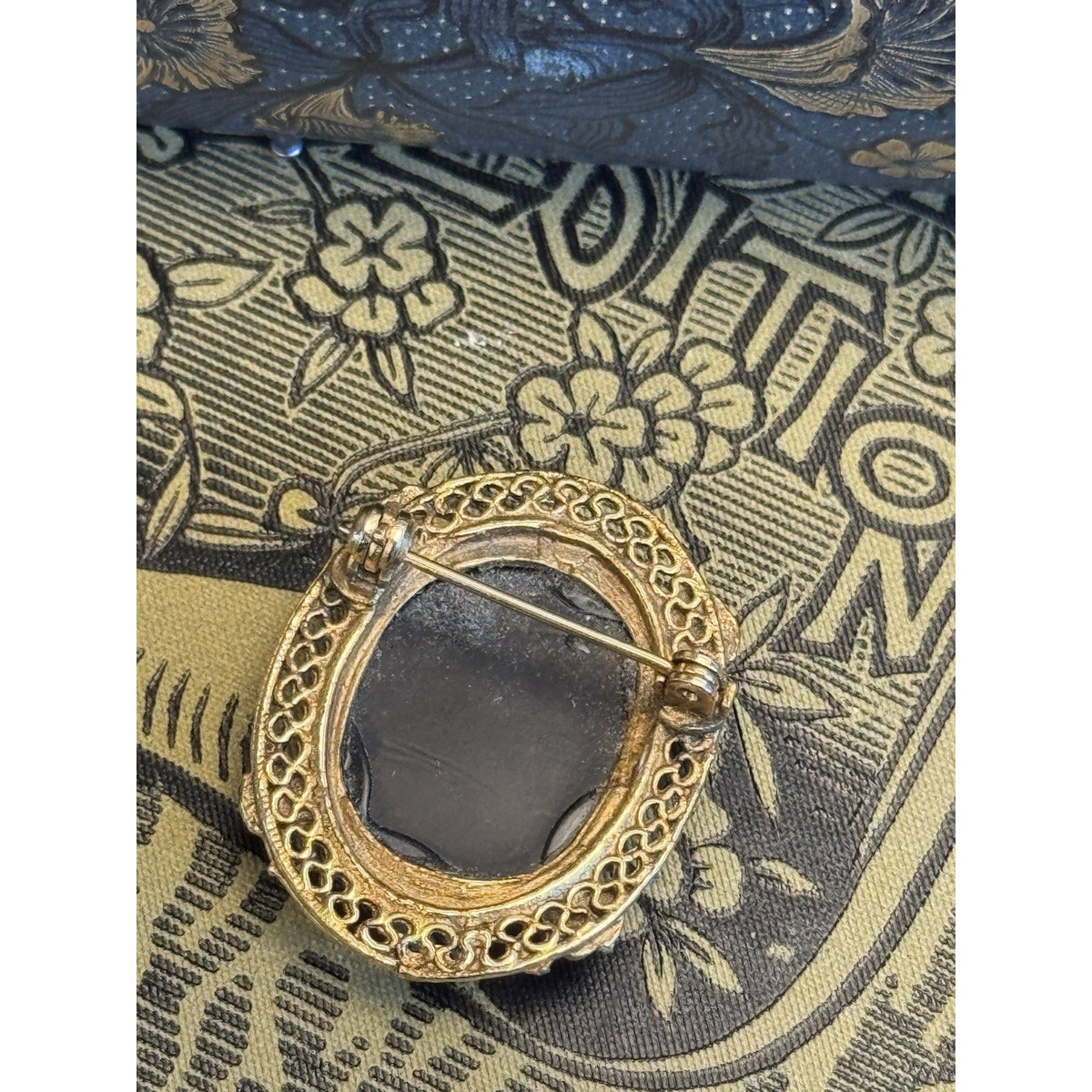 Cameo Brooch Black Portrait Goldtone Filigree Floral Frame Vintage 1.25” x 1”