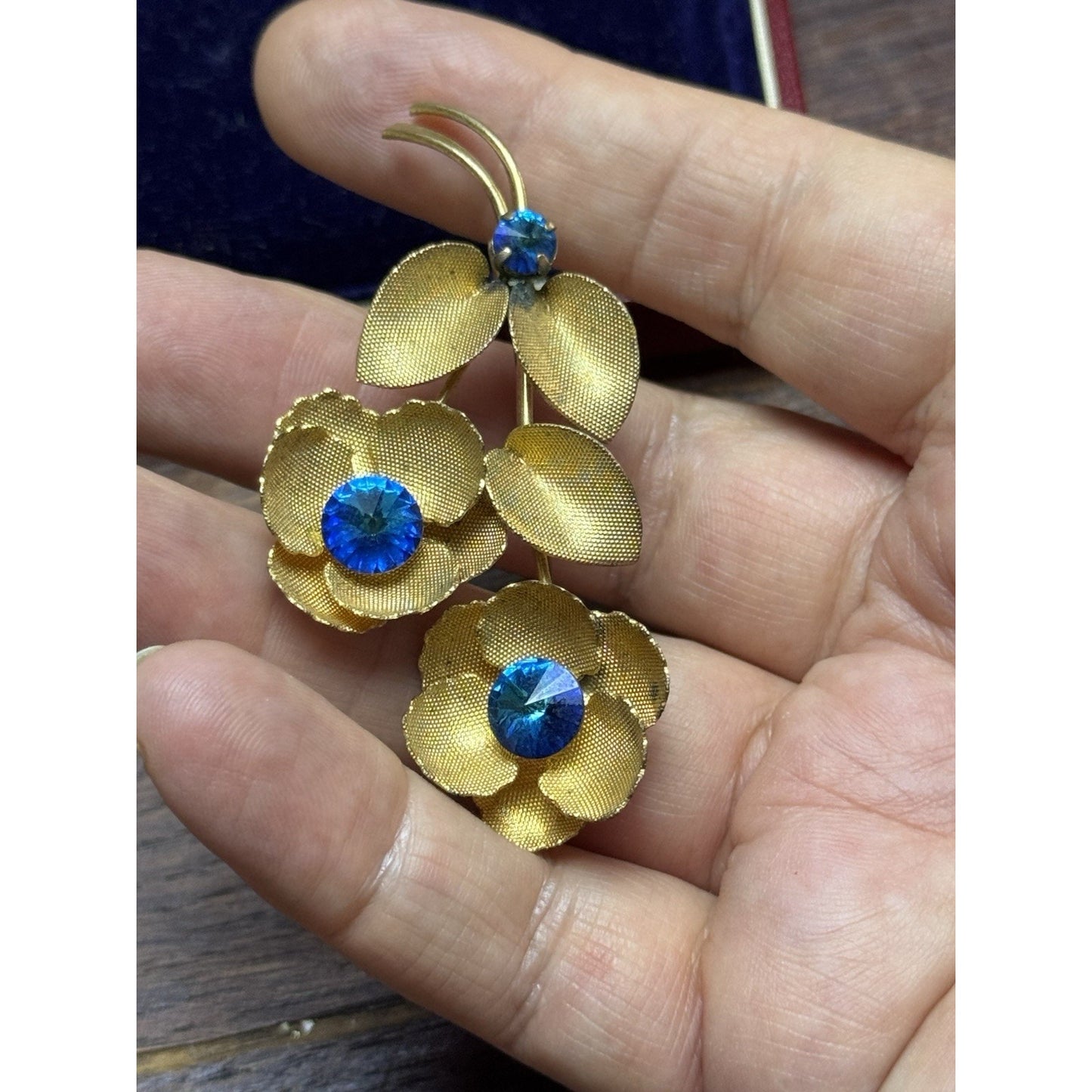 Vintage Goldtone Blue Rhinestone Flower Brooch Textured Floral Pin 2.5”