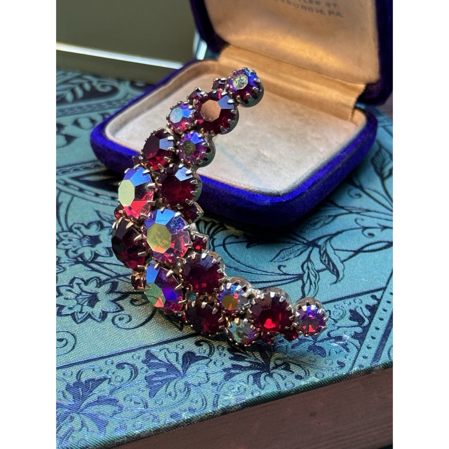 Karu Arke Inc Crescent Moon Brooch Red Aurora Borealis Rhinestone 2” Vintage
