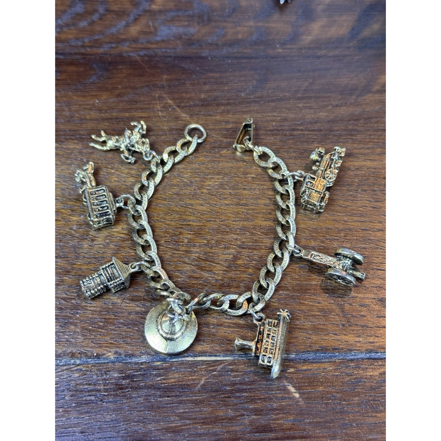 Vintage Goldtone USA Travel Charm Bracelet 7 Charms 6.75” Souvenir Jewelry