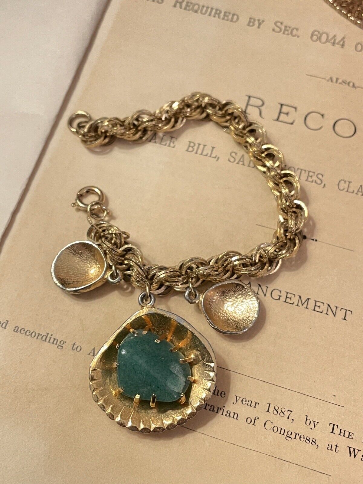 Vintage Gold Tone Shell Charm Bracelet With Jade Like Stone