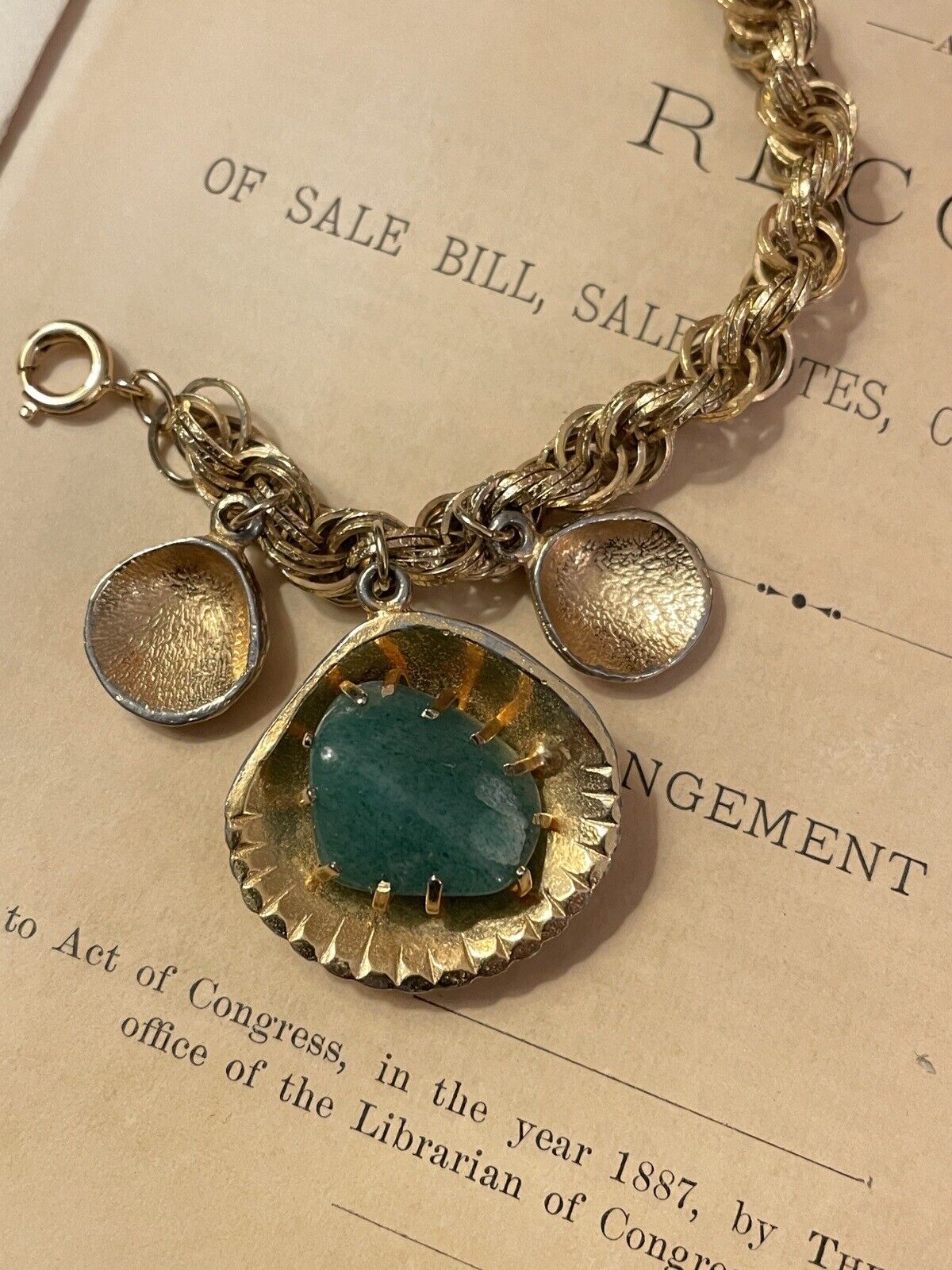 Vintage Gold Tone Shell Charm Bracelet With Jade Like Stone