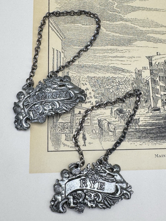 2 Vintage Barware Bottle Tags “Sherry” “Rye” K Ewer NJ Pewter