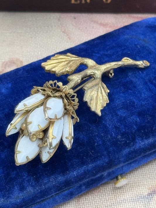 Vintage Brooch Milk Glass Flower Gold Tone Stem and Leaves 2.75” x 1.25”