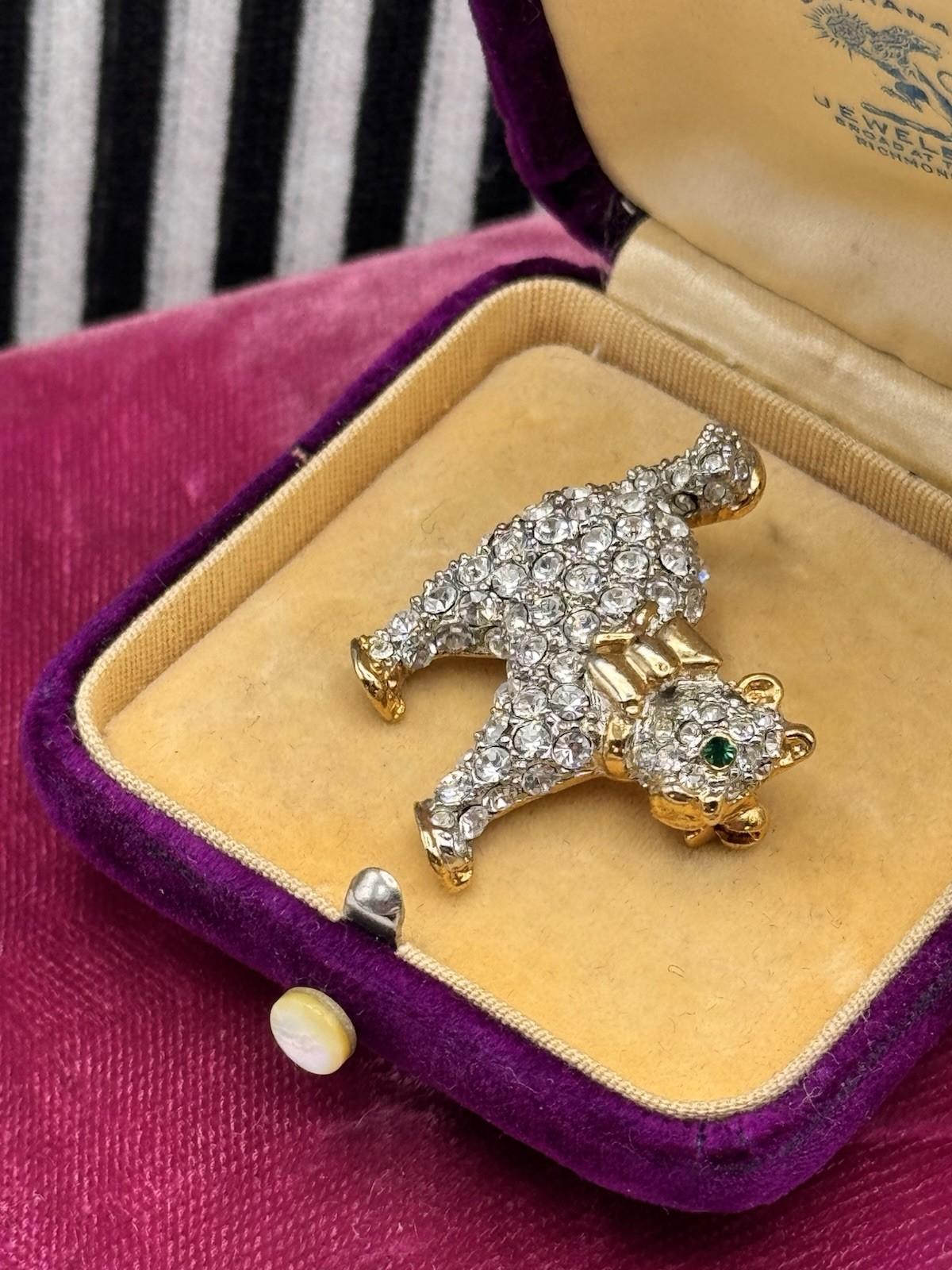 Vintage Rhinestone Cat Brooch Pin Goldtone Clear Crystals Green Eyes 1.25”