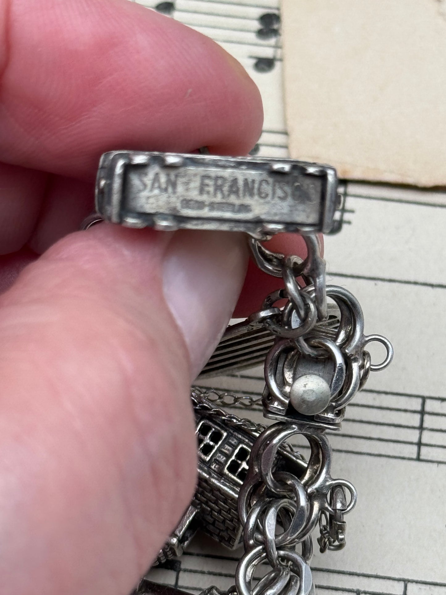 Vintage Sterling Silver Bracelet Signed Danecraft with 12 Charms some  California