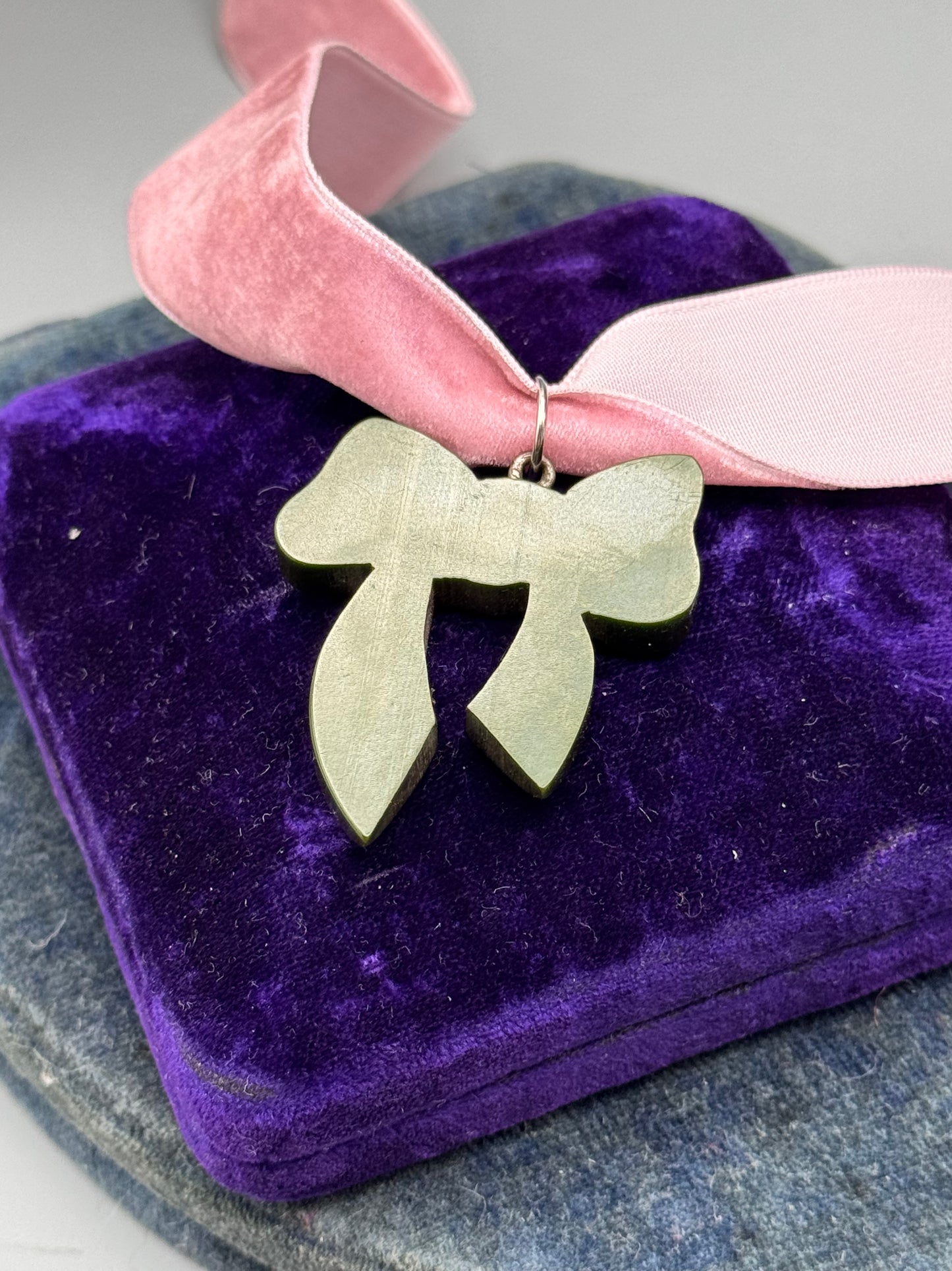 Bakelite Bow Pendant Green Carved Ribbon 1.5”