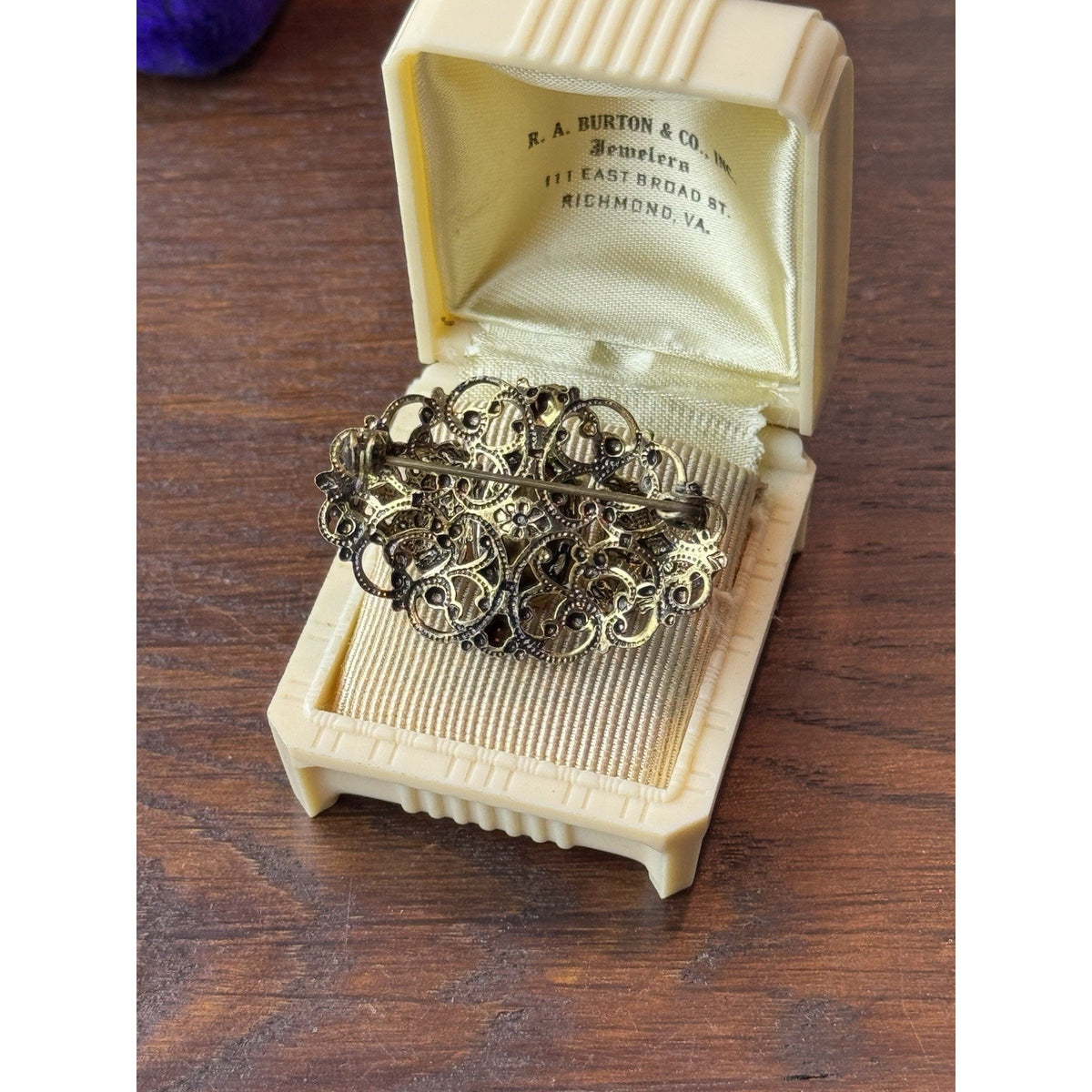Red Rhinestone Brooch Filigree Goldtone Ornate 1 5/8” x 1”