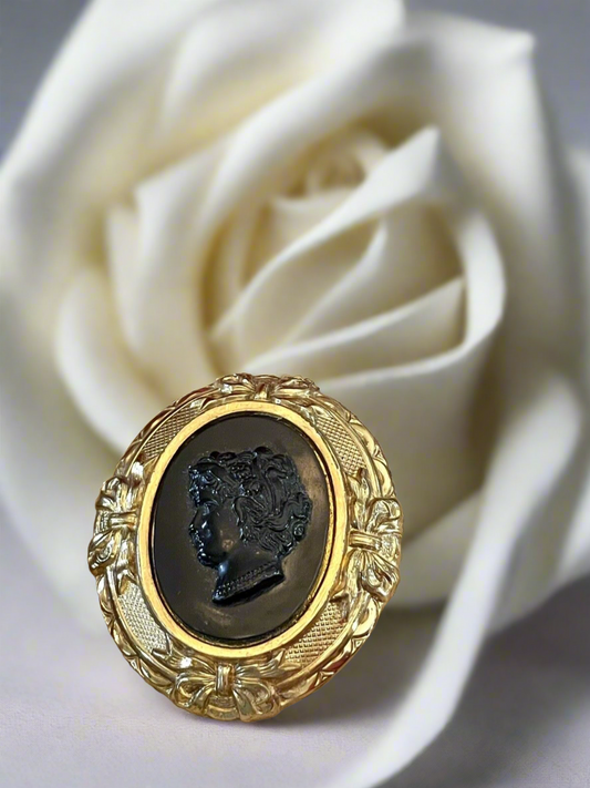 Black Cameo Left Facing Brooch Goldtone Frame Repoussé Vintage