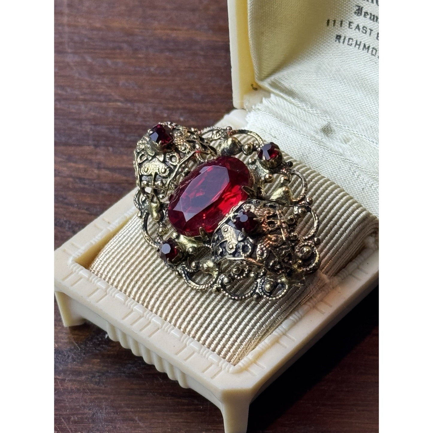 Red Rhinestone Brooch Filigree Goldtone Ornate 1 5/8” x 1”