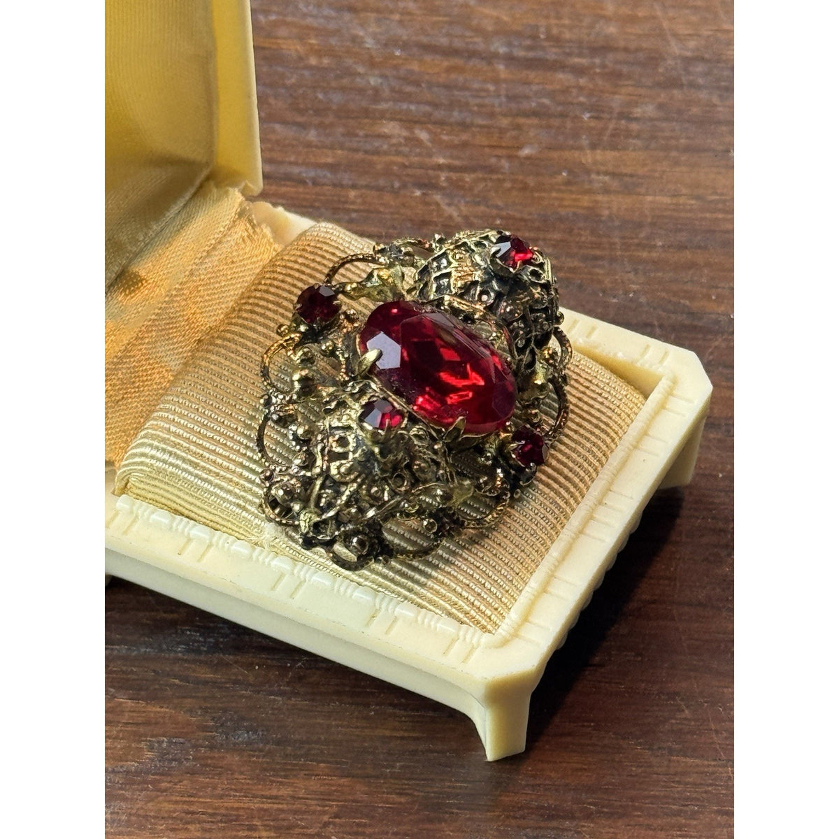 Red Rhinestone Brooch Filigree Goldtone Ornate 1 5/8” x 1”