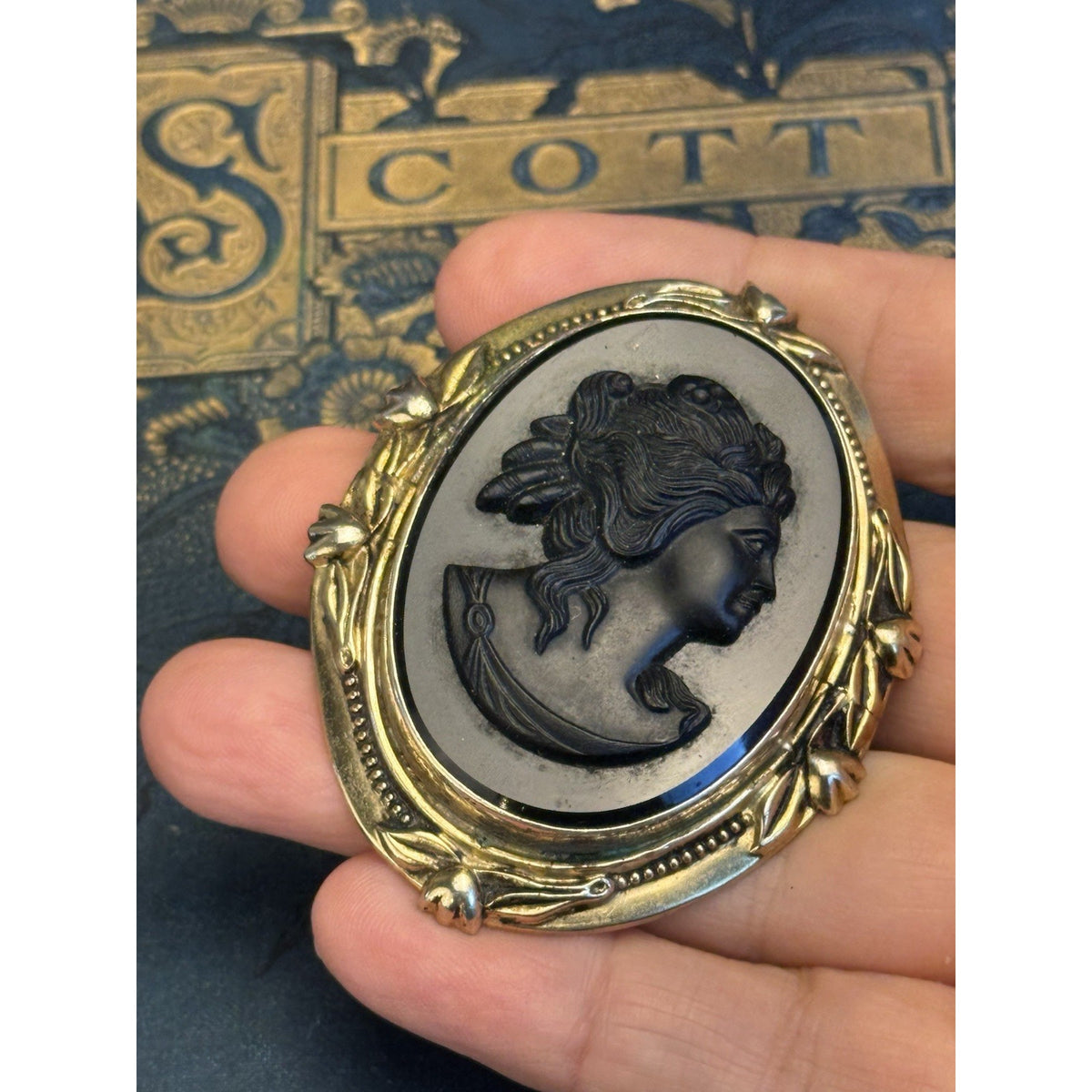 Cameo Brooch Black Glass Goldtone Floral Frame Victorian Style Vintage 2.5” x 2”