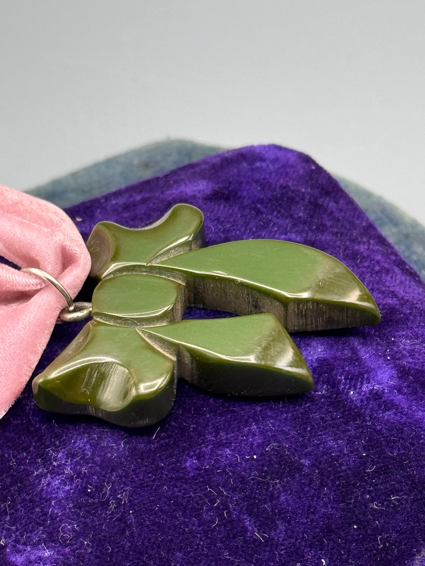 Bakelite Bow Pendant Green Carved Ribbon 1.5”
