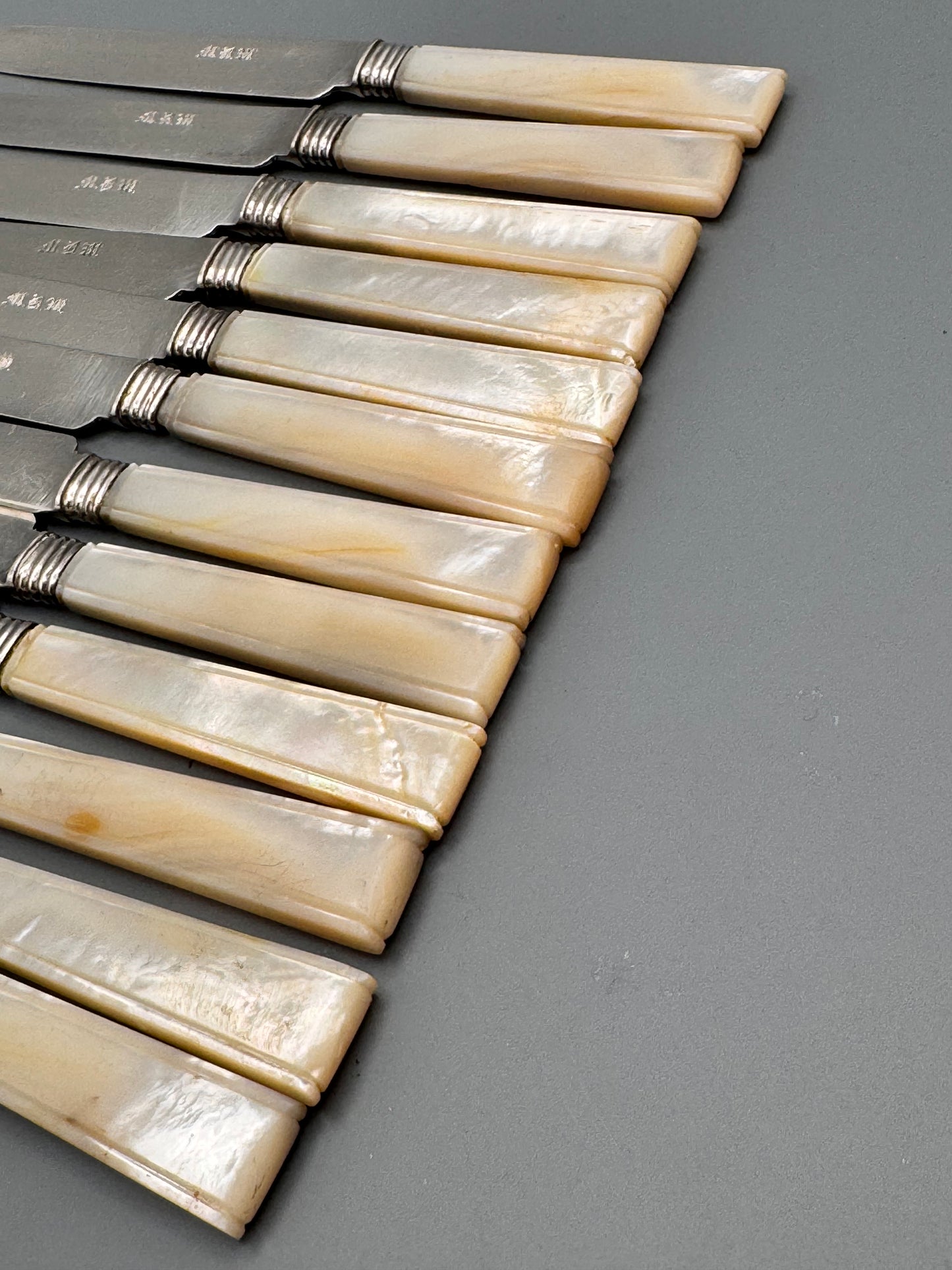 Set of Twelve Henry David New York Coin Silver Knives

Mother of Pearl Handles | Circa 1846–1867