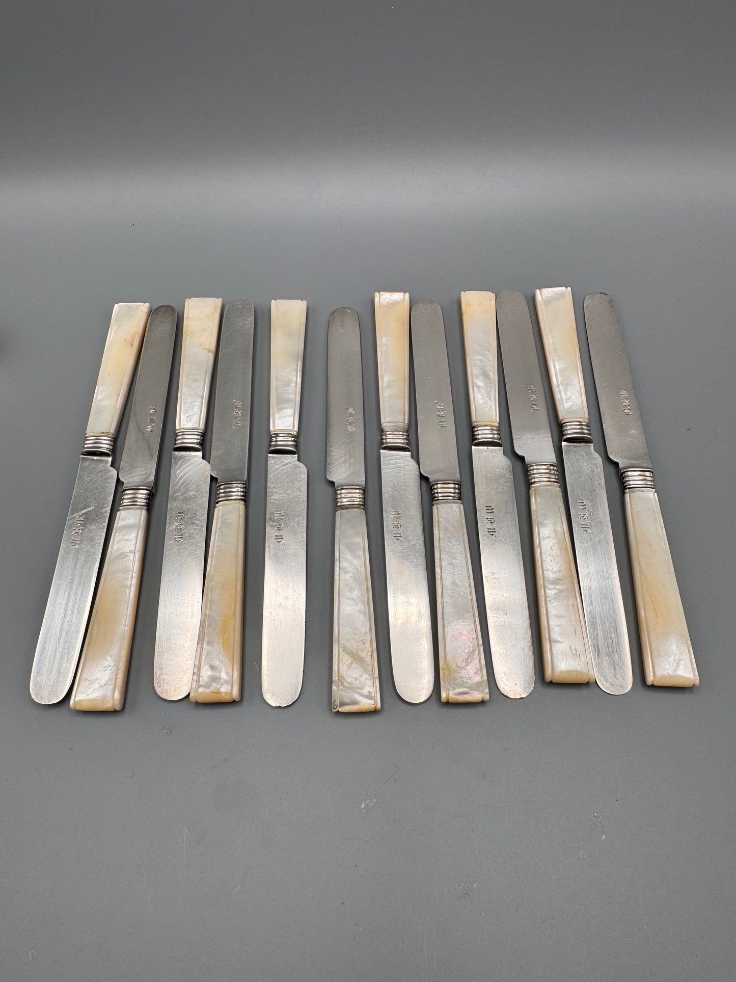 Set of Twelve Henry David New York Coin Silver Knives

Mother of Pearl Handles | Circa 1846–1867