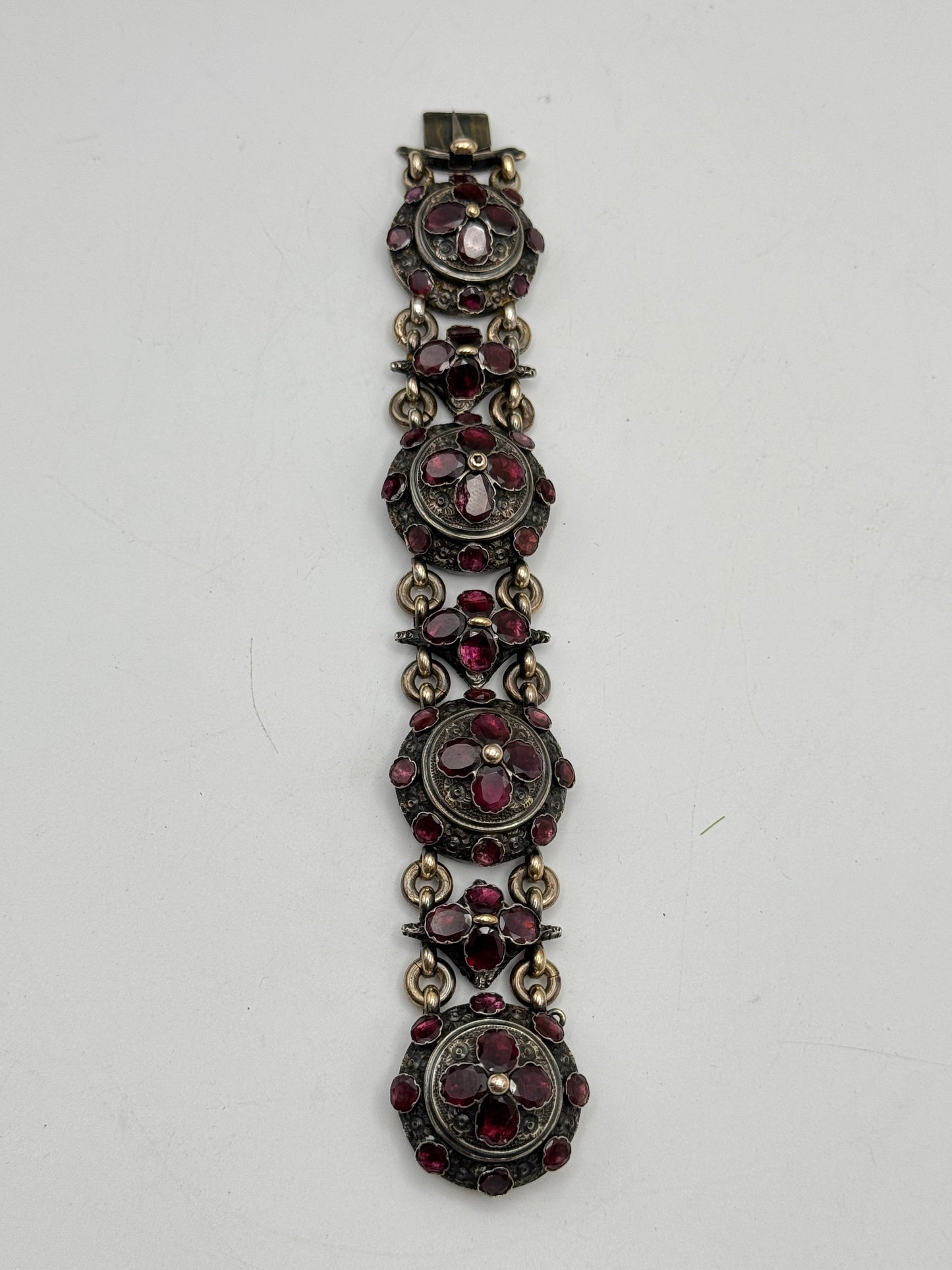 ANTIQUE GEORGIAN Repoussé Bracelet in Silver with Table Cut Garnets