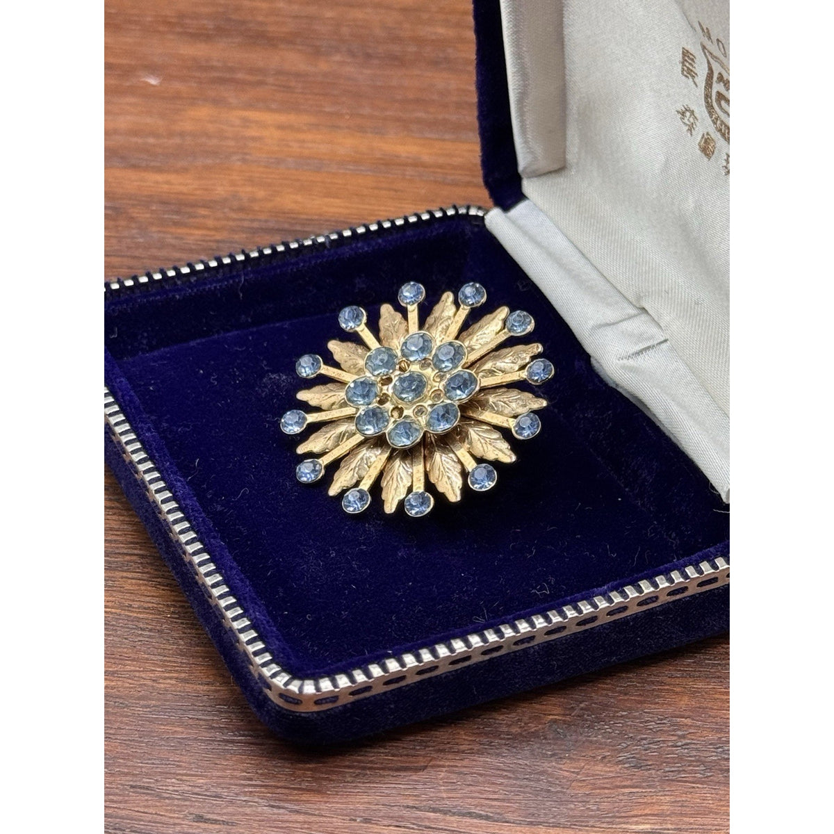 Vintage Brooch Blue Rhinestone Goldtone Floral Sunburst Statement Pin 1.5”