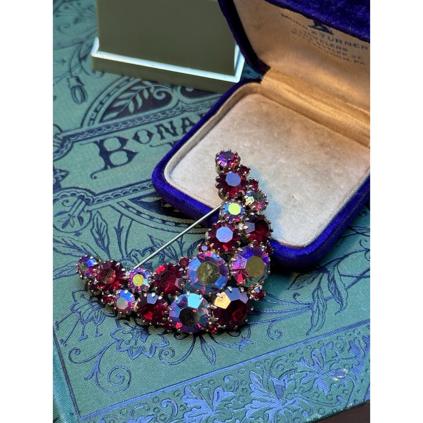 Karu Arke Inc Crescent Moon Brooch Red Aurora Borealis Rhinestone 2” Vintage