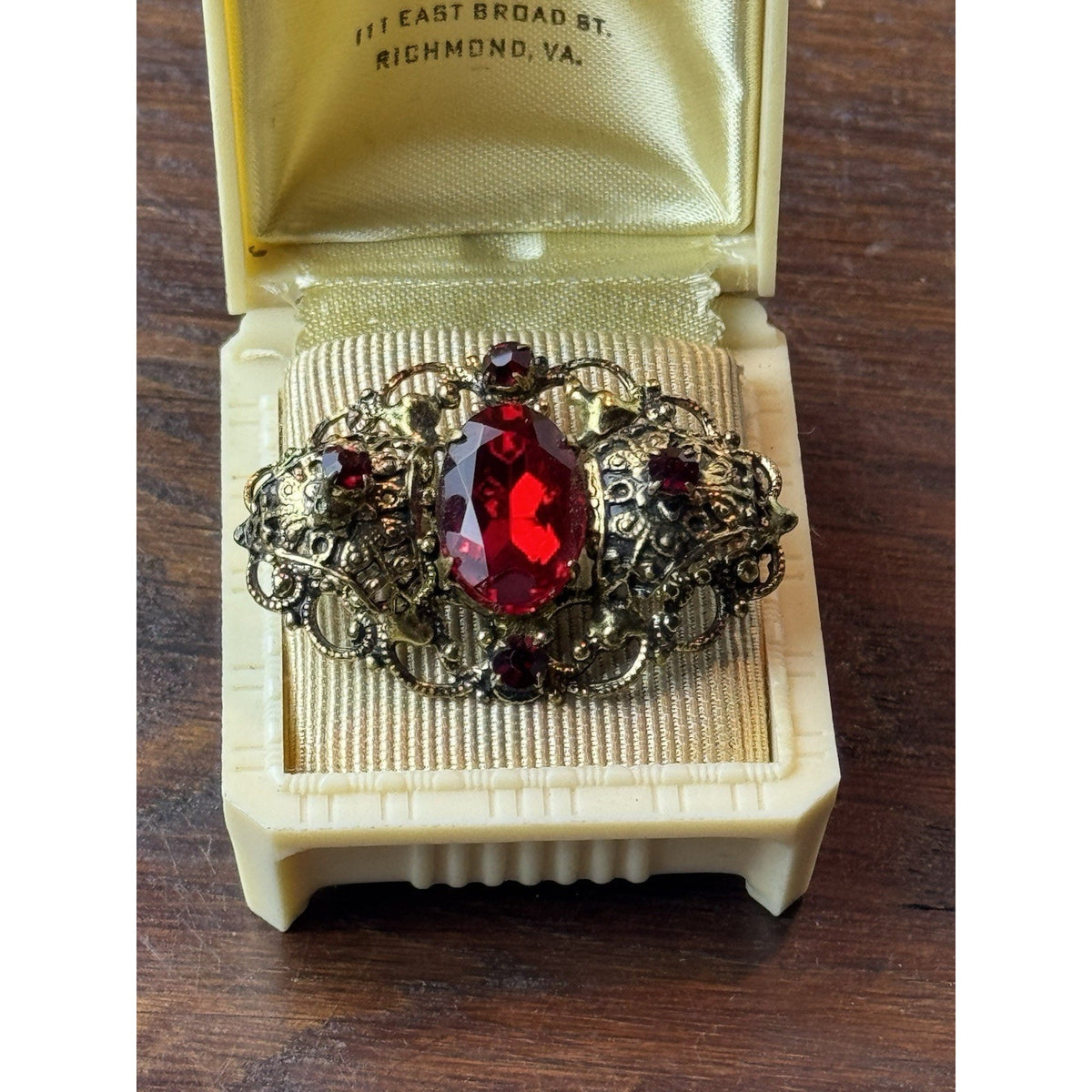 Red Rhinestone Brooch Filigree Goldtone Ornate 1 5/8” x 1”