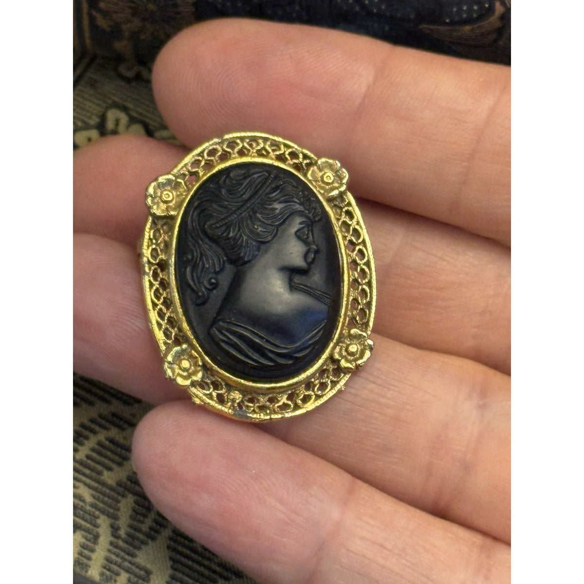 Cameo Brooch Black Portrait Goldtone Filigree Floral Frame Vintage 1.25” x 1”
